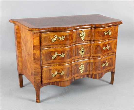 An 18th century Continental walnut commode W.3ft9in. D.2ft. H.2ft6in.